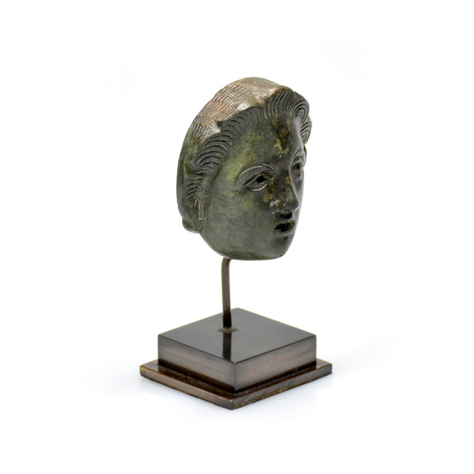 A Roman bronze head attachment of a youth, ca 1st-2nd century AD by Onbekende Kunstenaar