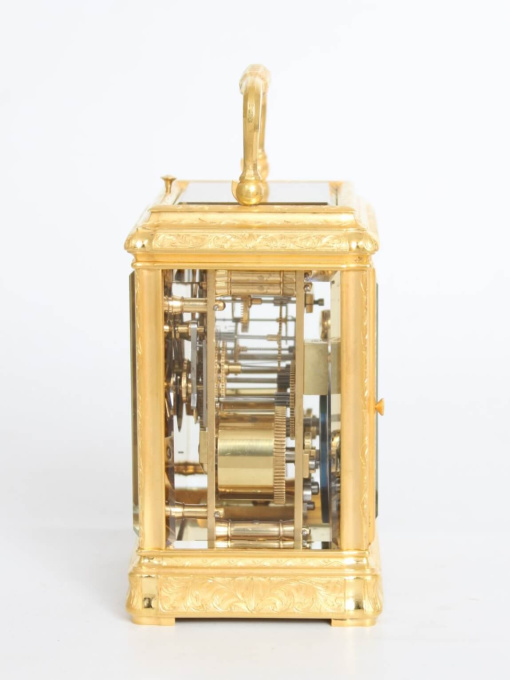 A French engraved gilt brass gorge case carriage clock, circa 1870 by Artiste Inconnu
