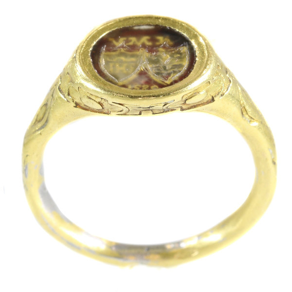 Renaissance brotherhood ring with two coat of arms behind transparant window by Artista Desconocido