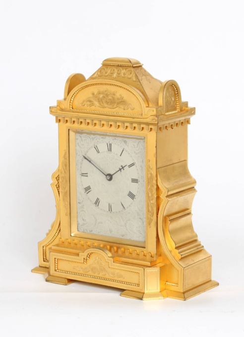 An English gilt brass table clock in the manner of Thomas Cole, circa 1860 by Manoah Rhodes Bradford