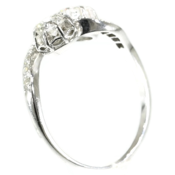 Vintage love ring so called toi et moi or cross over ring with diamonds by Artista Desconocido