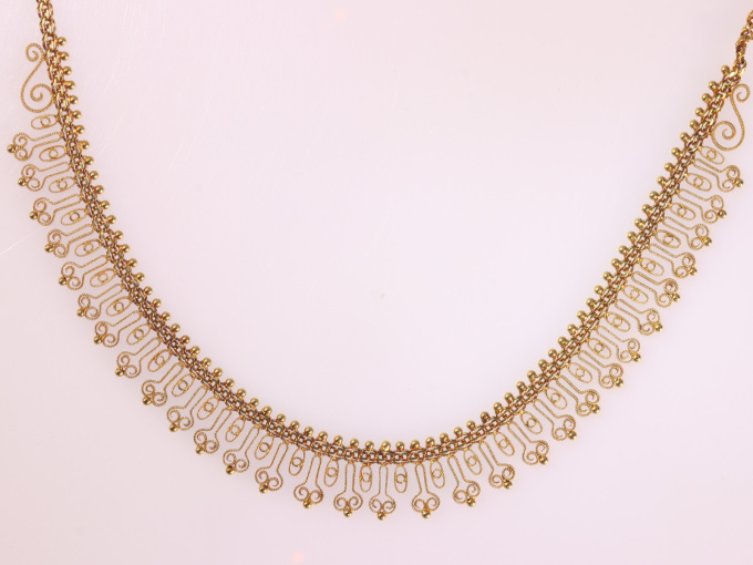 Antique Dutch Etruscan revival gold filigree bow necklace by Artista Desconocido