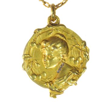 French gold chain and locket with rose cut diamonds depictging a woman, late 19th Century signed Janvier by Unknown Artist