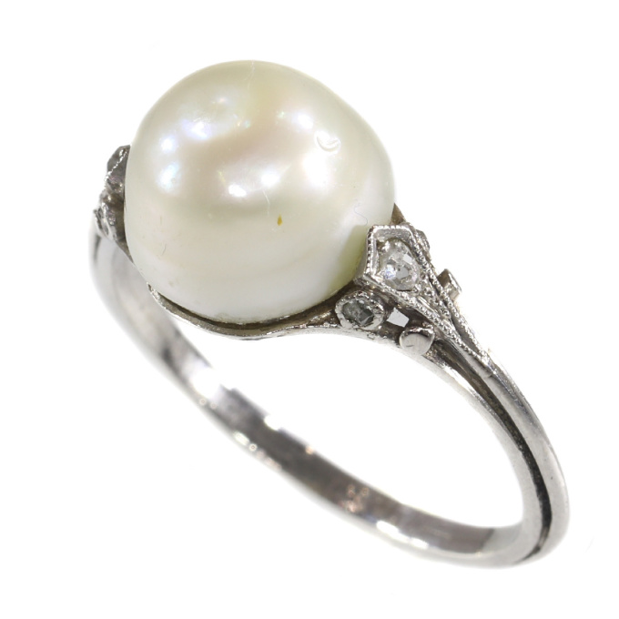 Vintage platinum ring with big pearl and rose cut diamonds by Artiste Inconnu