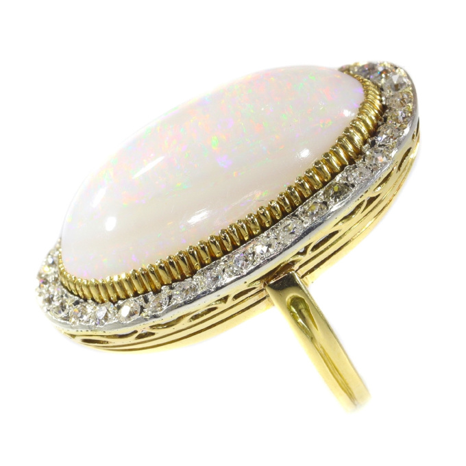 Antique large opal and diamonds ring by Artista Sconosciuto