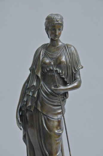Bronze statue of a Classical Female Figure  by Onbekende Kunstenaar