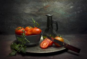 Tomato on a plate  by Mos Merab Samii