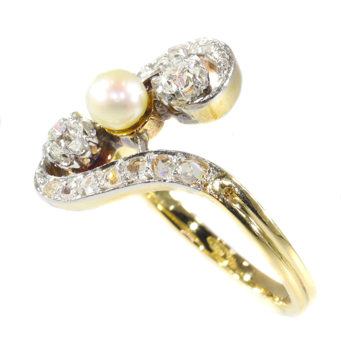 Antique diamond and pearl cross-over engagement ring by Onbekende Kunstenaar