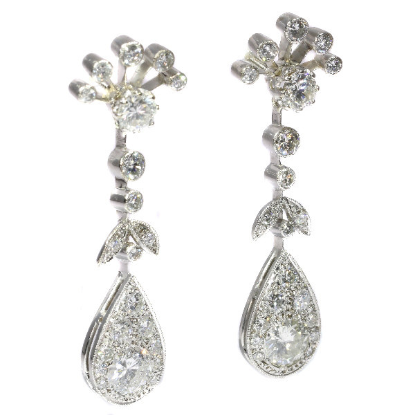 Vintage long pendent platinum cocktail ear jewels abundantly set with diamonds by Unknown artist