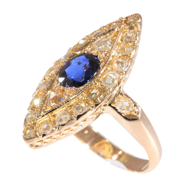 Vintage antique diamond marquise shaped ring with natural sapphire by Artiste Inconnu