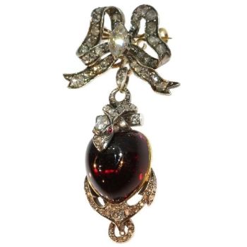 Early-Victorian diamond brooch-pendant medallion large heart shaped garnet cabochon snake anchor and bow by Unknown Artist