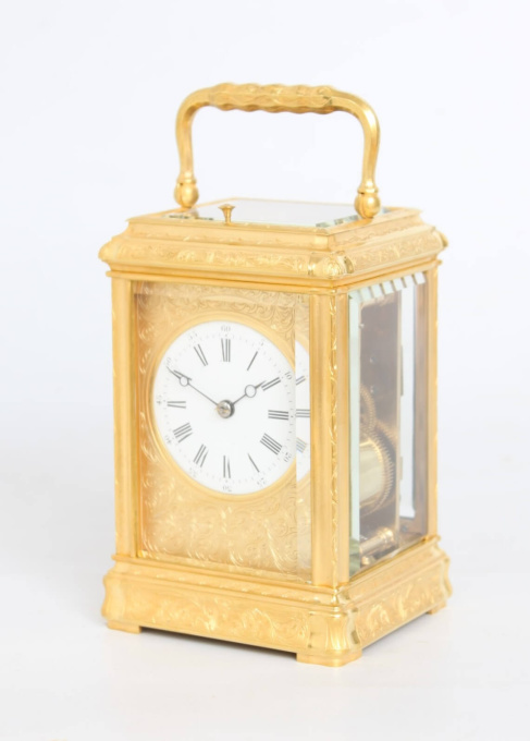 A French engraved gilt brass gorge case carriage clock, circa 1870 by Artiste Inconnu