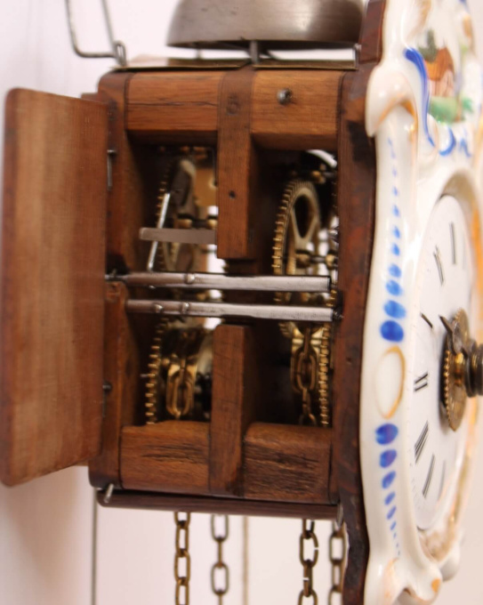 A small German polychrome striking and alarm wall clock, circa 1860 by Artista Desconocido