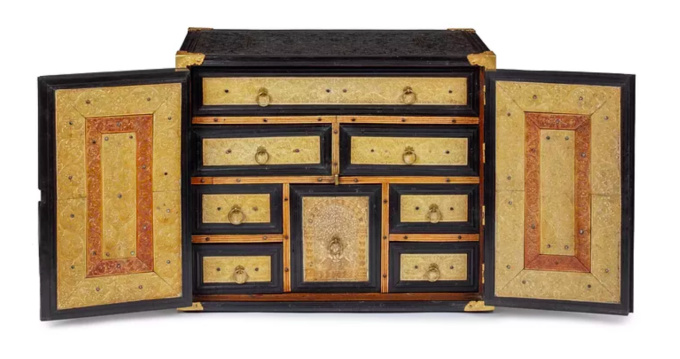  A rare two-door low-relief carved ebony and ivory cabinet with gilt-brass mounts by Unknown Artist