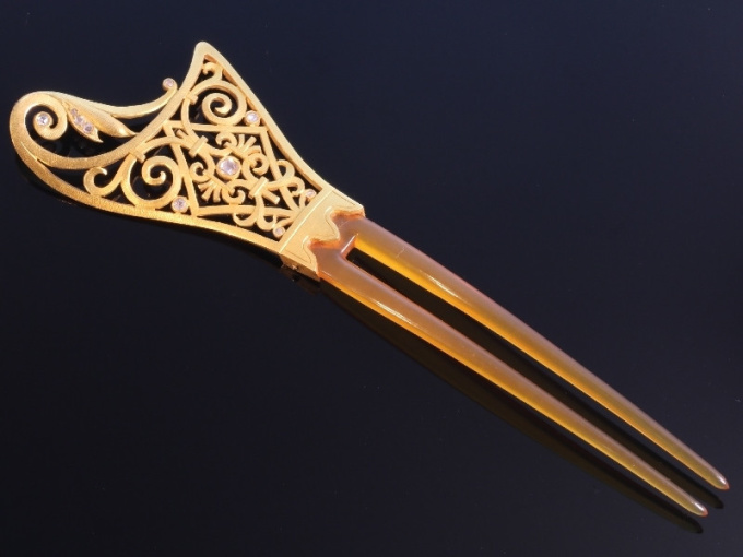 Art Nouveau French gold hair comb with diamonds and made from horn by Unknown Artist