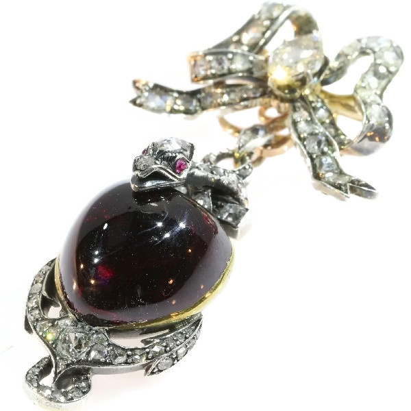 Early-Victorian diamond brooch-pendant medallion large heart shaped garnet cabochon snake anchor and bow by Artista Desconhecido