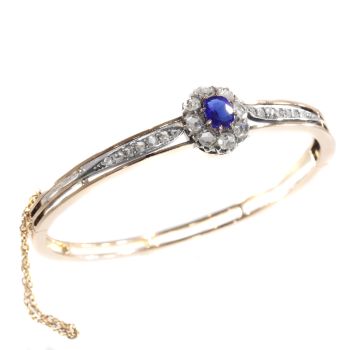 Antique Victorian gold bangle set with diamonds and blue strass by Unknown Artist