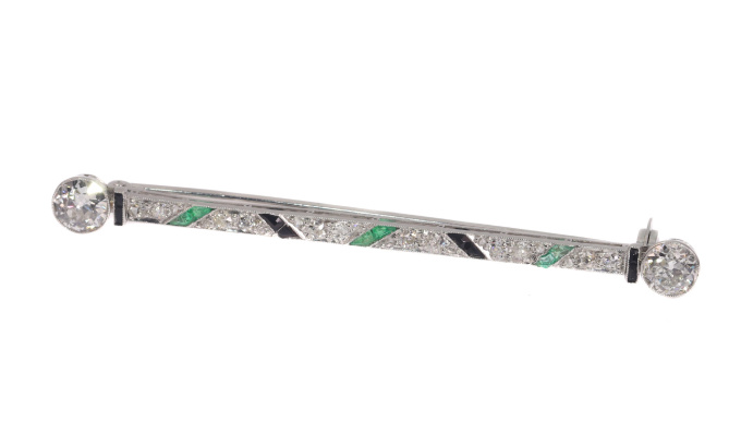 Vintage Art Deco platinum diamond bar brooch also set with onyx and emeralds by Artista Desconocido