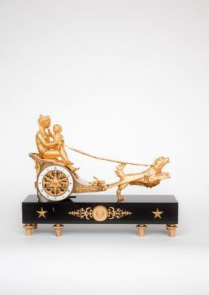 A French empire ormolu and marble chariot mantel clock, circa 1800 by Onbekende Kunstenaar