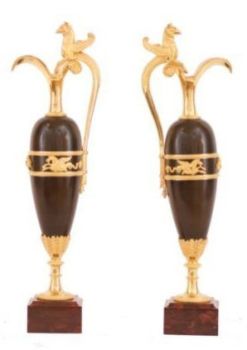 A pair of empire patinated bronze and fire gilded ewers, Circa 1810 by Unknown artist