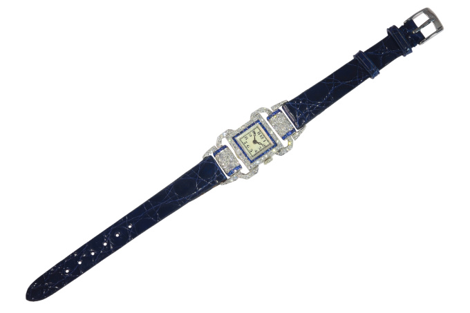 Vintage Art Deco platinum ladies wrist watch made by Leon Hatot set with diamonds and sapphires by Leon Hatot