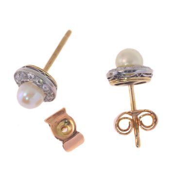 Antique diamond and pearl earstuds by Unknown Artist