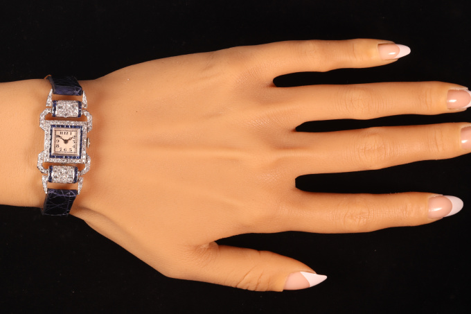 Vintage Art Deco platinum ladies wrist watch made by Leon Hatot set with diamonds and sapphires by Leon Hatot