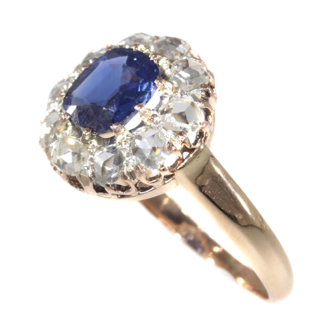 Victorian antique engagement ring with natural sapphire and ten rose cut diamonds by Onbekende Kunstenaar