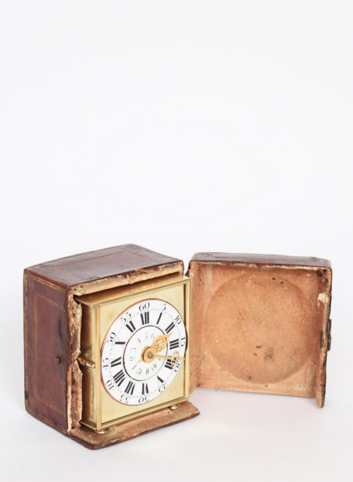 A rare and small German brass travel alarm clock with travel case, circa 1770 by Artiste Inconnu