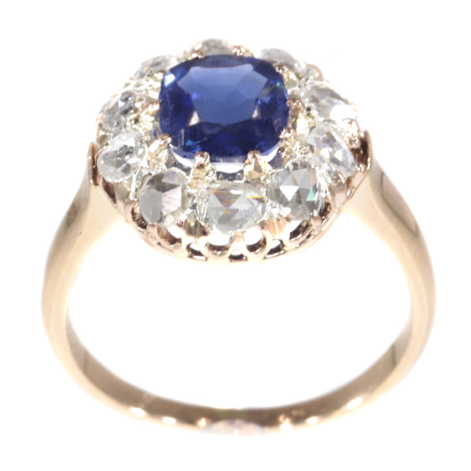 Victorian antique engagement ring with natural sapphire and ten rose cut diamonds by Unknown artist