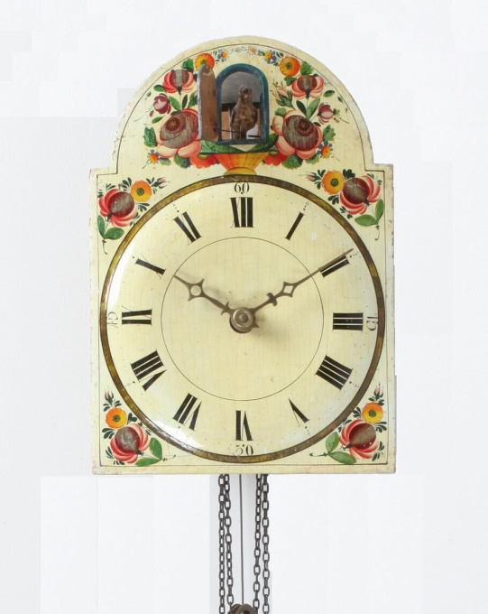 An early German Black Forest Cuckoo wall clock, circa 1830 by Artiste Inconnu