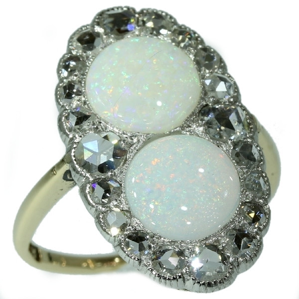 Antique Victorian engagement ring with rose cut diamonds and cabochon opals by Unknown artist