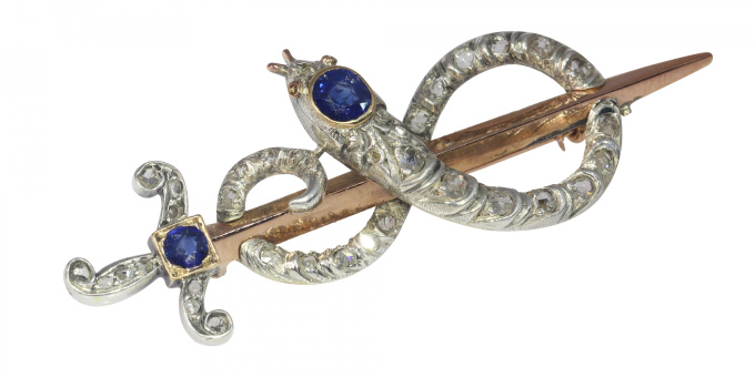 Antique gold diamond and sapphire brooch snake wrapped around sword or dagger by Artista Sconosciuto