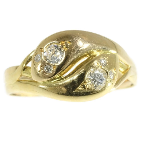 Antique double headed gold snake ring with diamonds by Artista Desconhecido