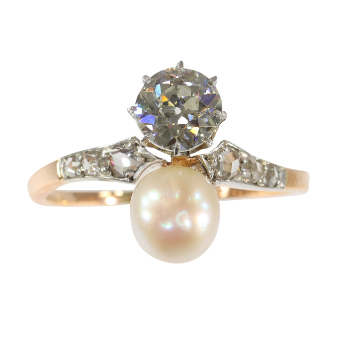 Vintage antique diamond and pearl engagement ring made around 1895 by Artista Desconocido