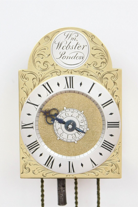 A rare and small English brass travel wall clock, William Webster London, circa 1730 by William Webster London