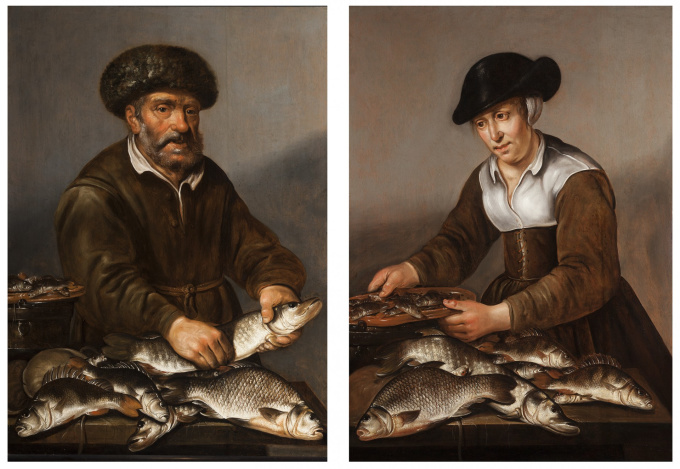 A Fisherman and Fisherwoman with fish on a table by Pieter de Putter