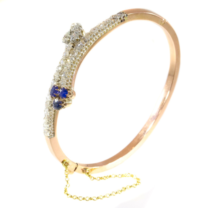 Victorian diamond and sapphire cross over bangle by Unknown artist