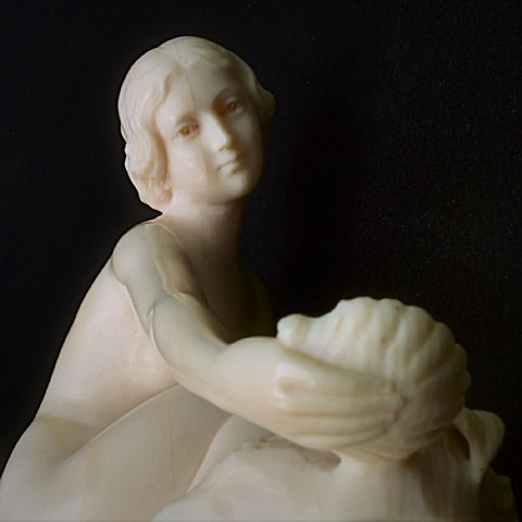 Art deco ivory sculpture Nude girl with shell  by C.H Middegaels
